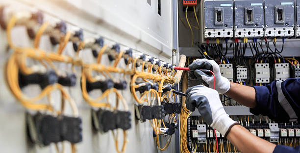 Professional Electrician technician working in Russell, KS